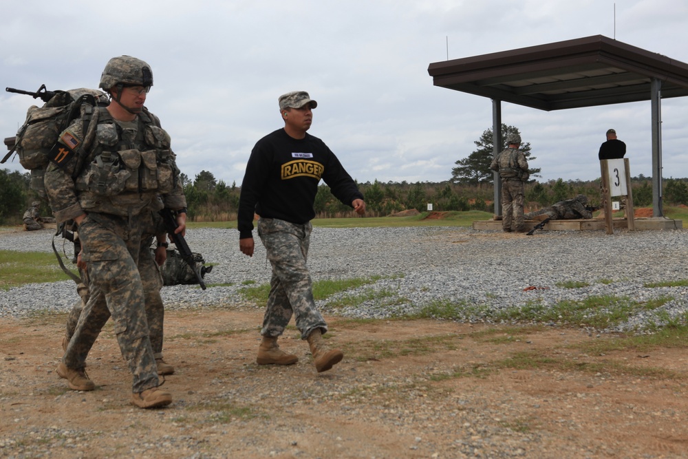 Competitors of the Best Ranger Competition are escorted on the range