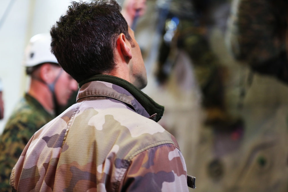 SPMAGTF-CR-AF Marines learn basic rock climbing techniques from French Commandos