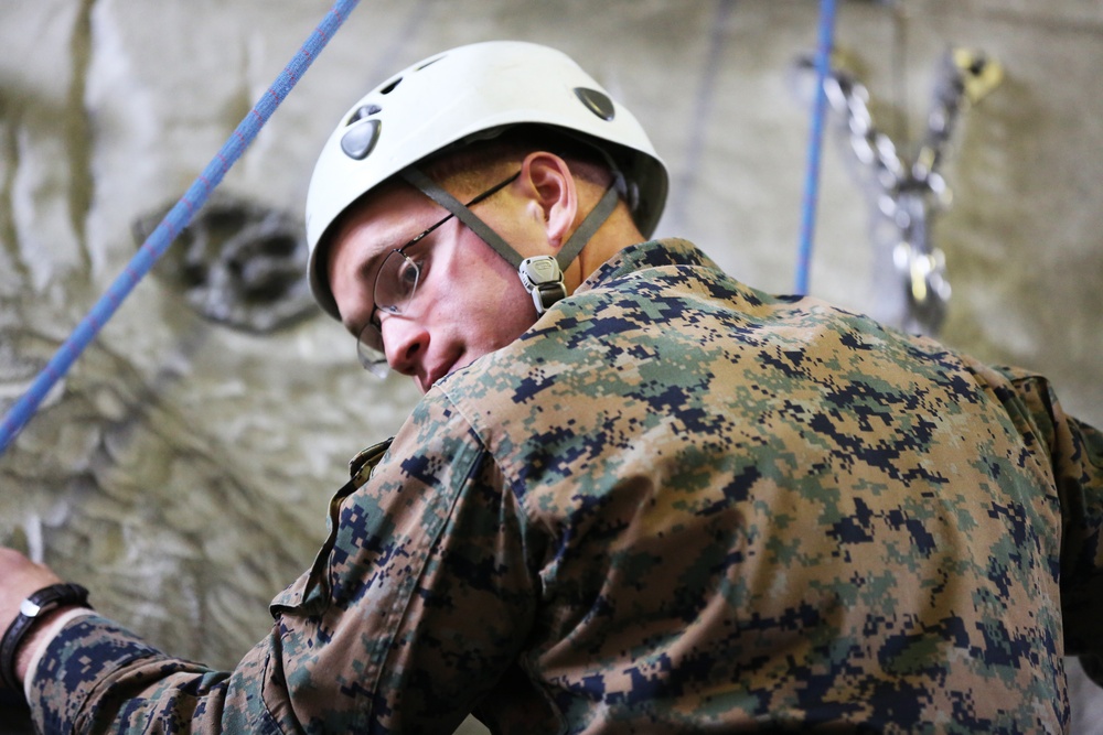 SPMAGTF-CR-AF Marines learn basic rock climbing techniques from French Commandos