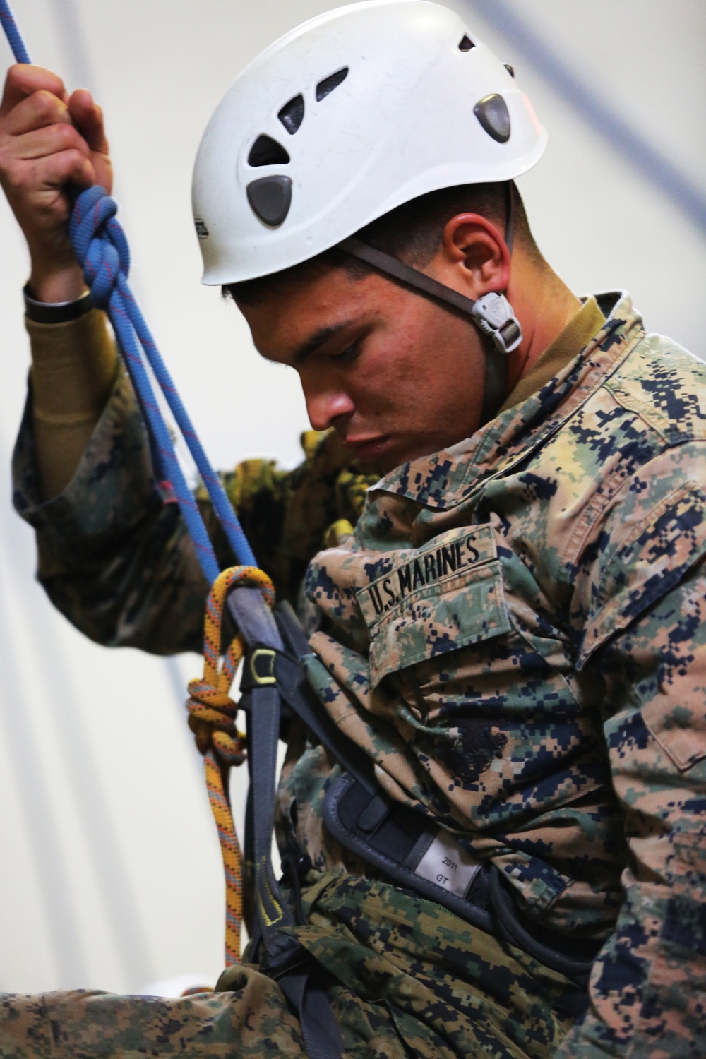 SPMAGTF-CR-AF Marines learn basic rock climbing techniques from French Commandos