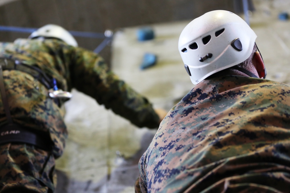 SPMAGTF-CR-AF Marines learn basic rock climbing techniques from French Commandos