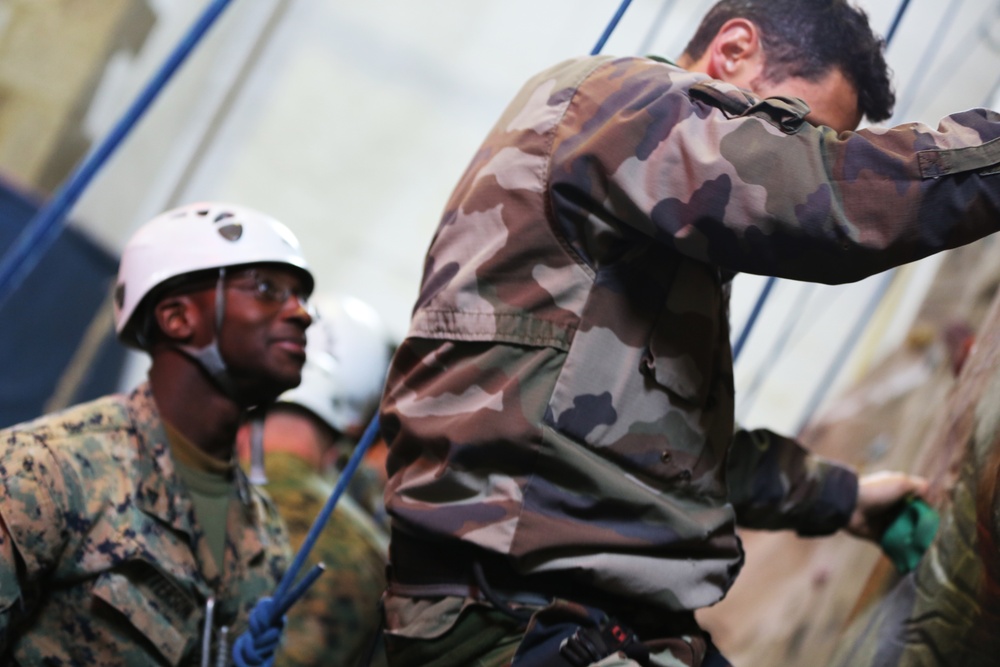 SPMAGTF-CR-AF Marines learn basic rock climbing techniques from French Commandos