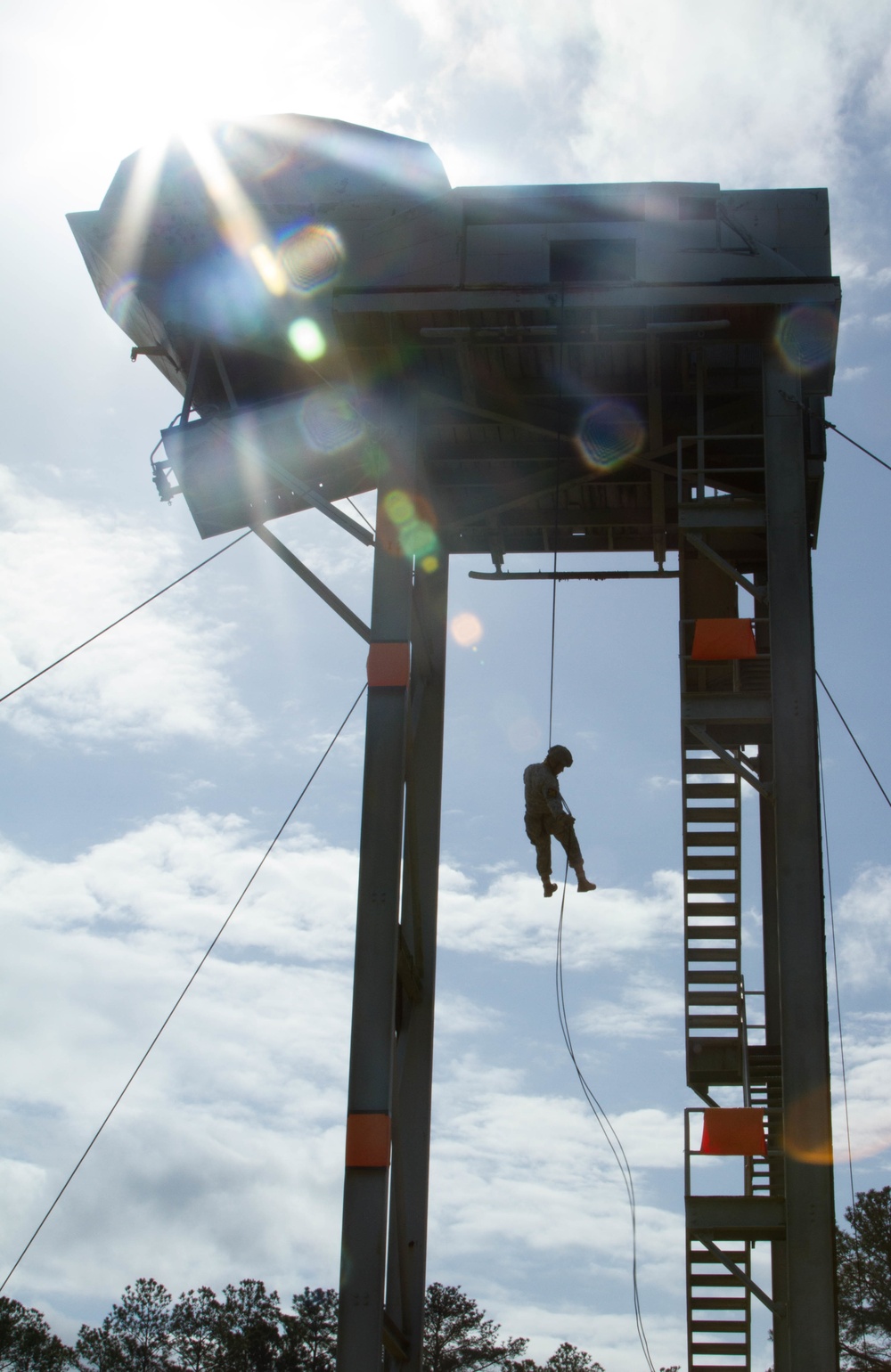 Army Ranger rappels from a tower during competition