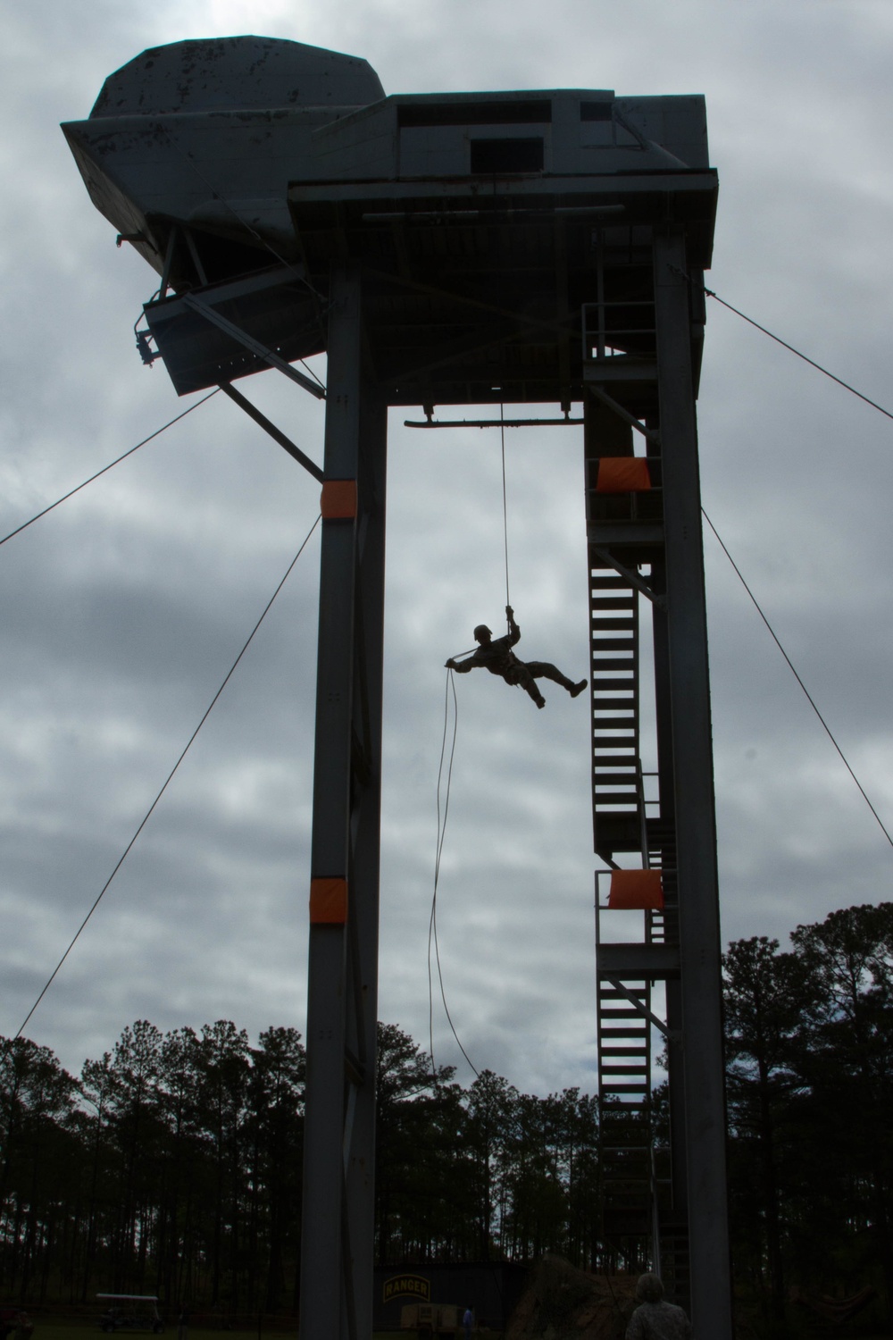 Army Ranger rappels from a tower during competition