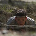 Army Ranger moves through obstacle