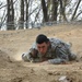 Soldier high crawls towards finish during 'Best Warrior' Competition in Korea