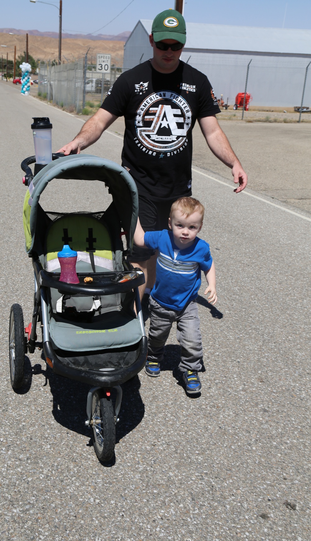 Sgt. Avery and his son stroll their way through No More 5K