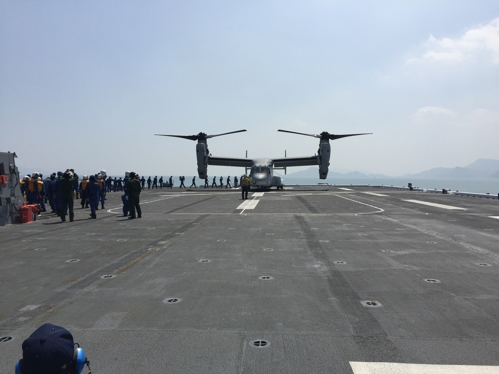 Marine Corps Ospreys launch from Japanese ships to support earthquake relief