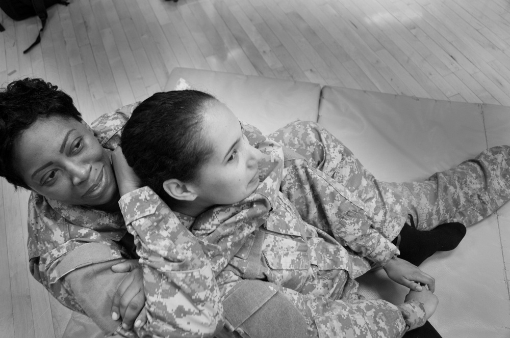 Learning to teach others to fight