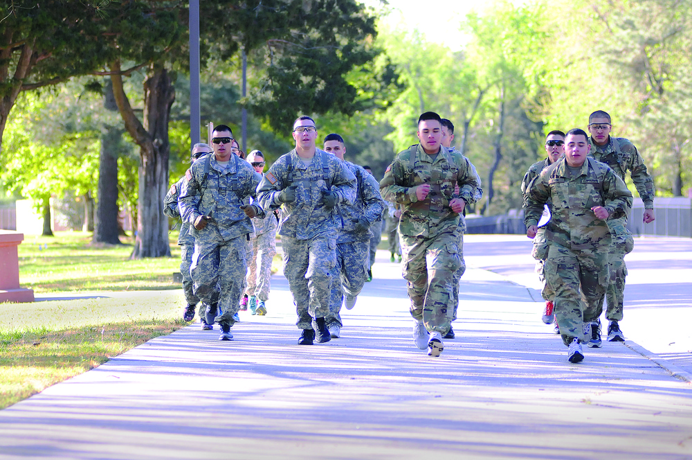 Soldiers run toward first obstacles in the 'Amazing Race'