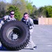 Soldiers flip tires during the 'Amazing Race'