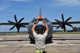 403rd AMXS crew chief marshalls in aircrew returning from Saber Junction 16