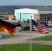 US and German flags fly outside 12th Combat Aviation Brigade Headquarters