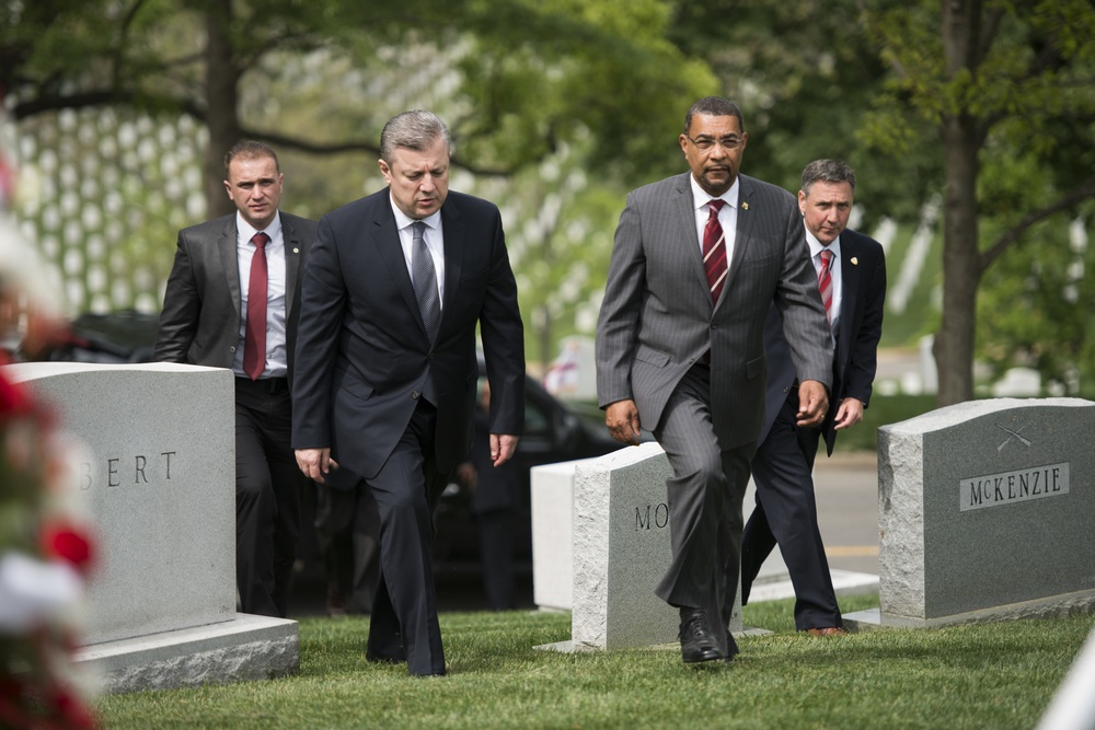 Prime Minister of Georgia lays a wreath at the gravesite of Gen. John Shalikashvili in Section 30 of Arlington National Cemetery