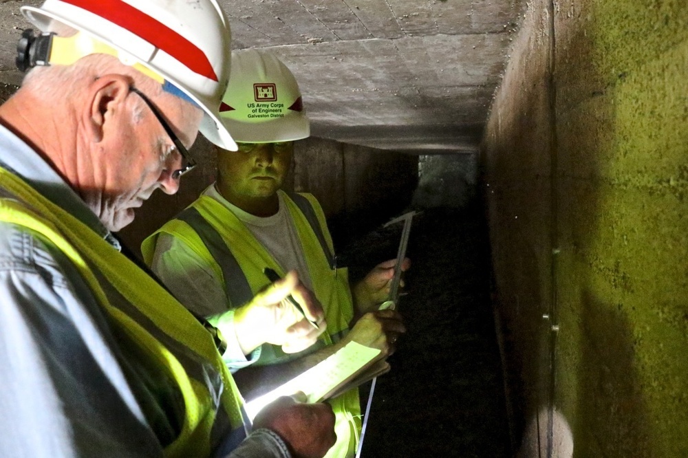 Survey teams conduct dam inspections