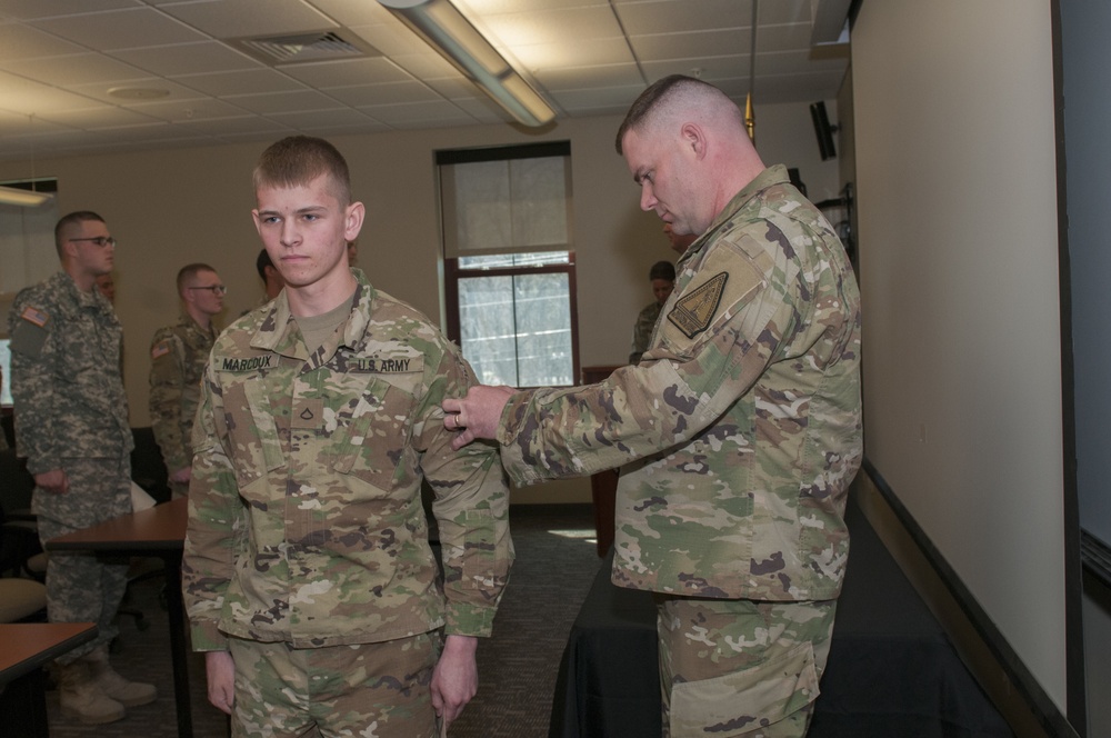 Soldier is Given Unit Patch
