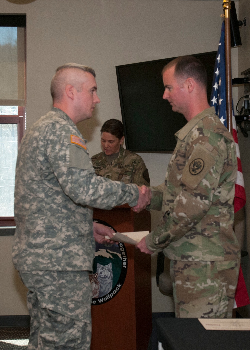 Soldier Given Certificate at Battle Hand-Off Ceremony
