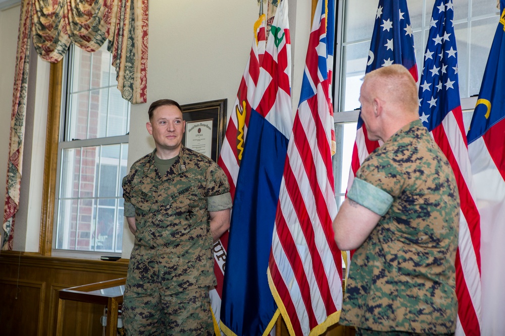 Brig. Gen. Weidley presents award