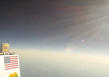 Quartermaster coin, regimental crest travel to stratosphere during high-altitude test