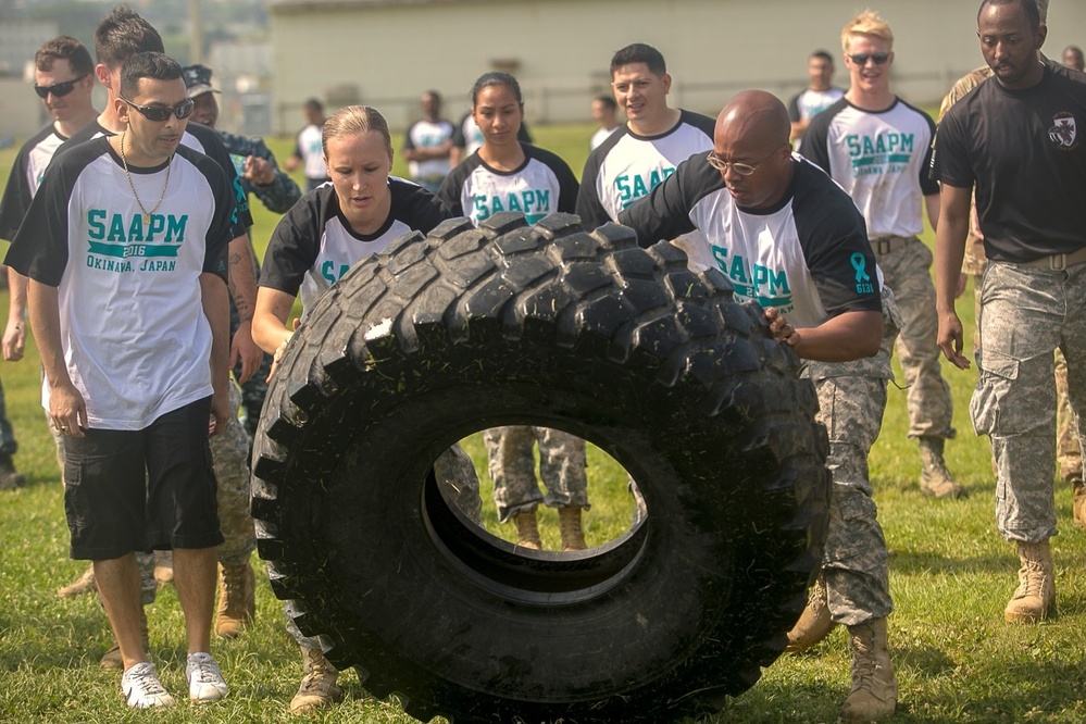 Service members compete in Sexual Assault Awareness and Prevention month field meet