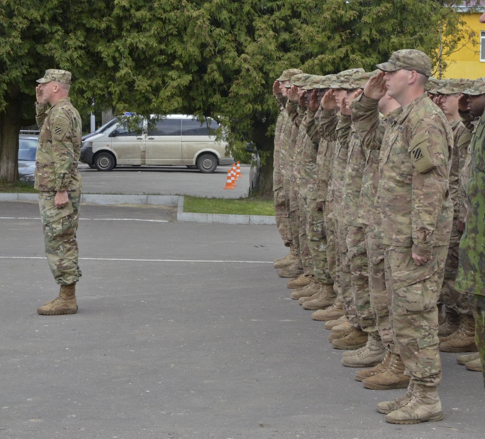 3-15 Infantry Soldiers stand in formation for a JMTG-U graduation ceremony