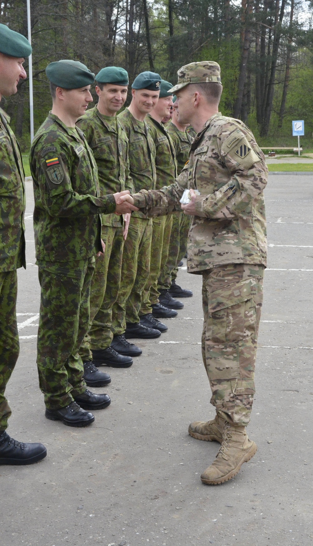 3-15 Infantry Commander presents coins to Lithuanian Soldiers