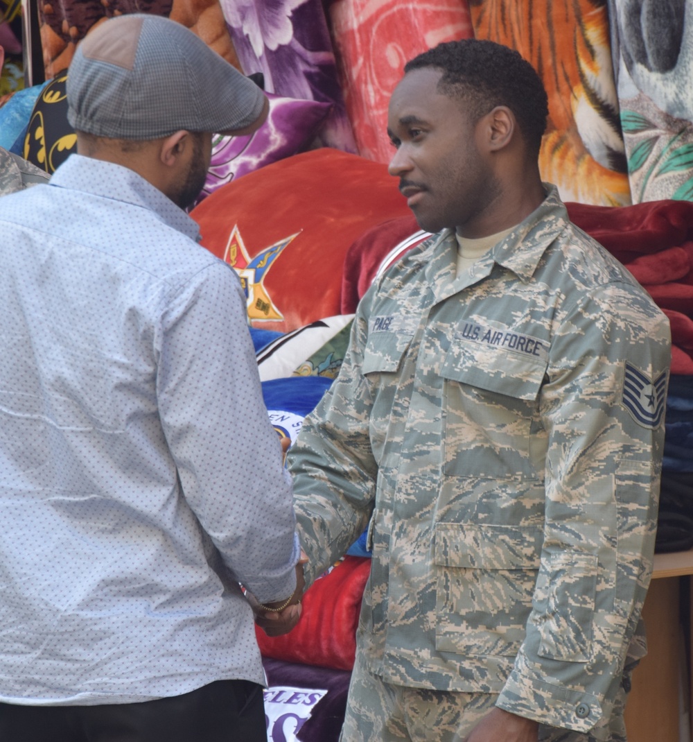 Father thanks an Airman for selfless service