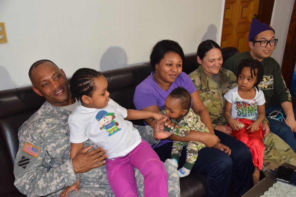 Soldiers meet with family rescued from fire