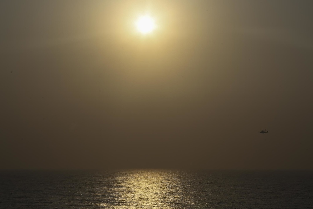 A CH-53E Super Stallion sunset flight