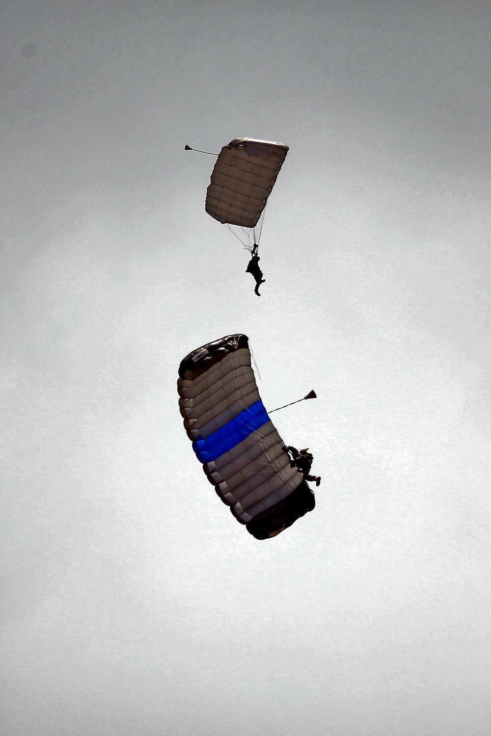 Air Force pararescuemen jump during Balikatan