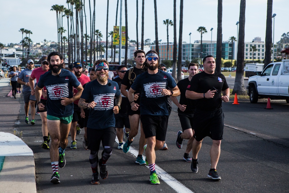 Recon Marines finish 1,500 mile run with veterans to honor hero