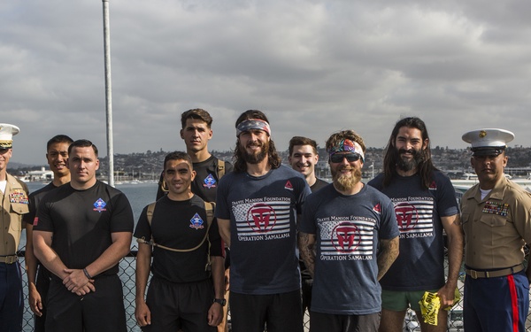 Recon Marines finish 1,500 mile run with veterans to honor hero