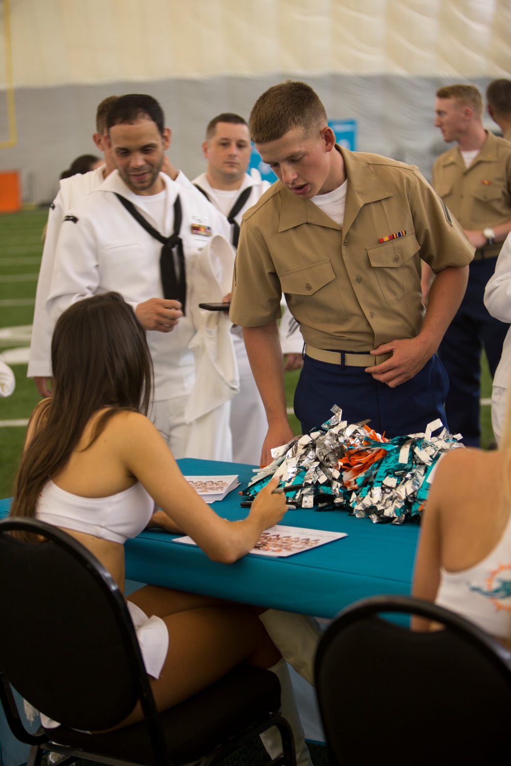 Fleet Week Marines and Sailors tour Miami Dolphins training facility