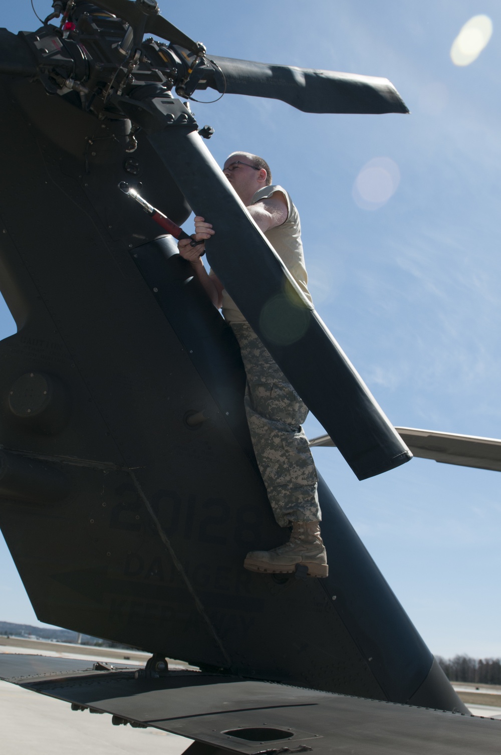 Black Hawk Mechanic Tightens Bolts