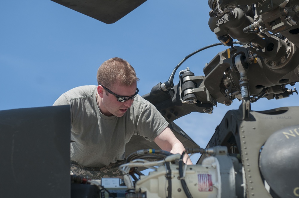 Instructor Pilot Performs Pre-flight Checks