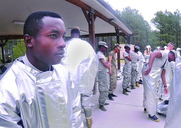 Soldier prepares to fight a controlled fire
