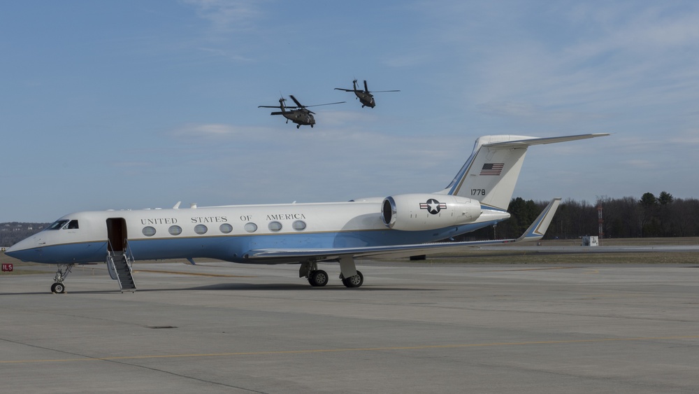 Black Hawks Fly Above Plane
