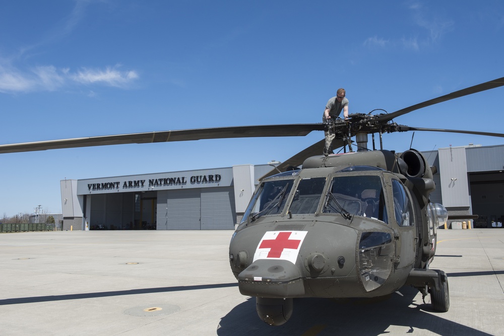 Instructor Pilot Performs Pre-Flight Checks