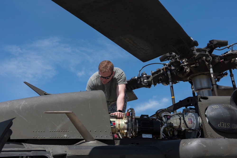 Instructor Pilot Performs Pre-Flight Checks