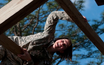 Soldiers navigate obstacles during Air Assault Obstacle Course event