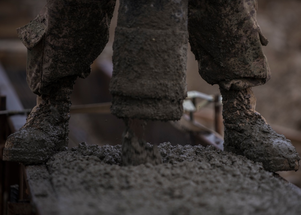 Dirt Boys get dirty laying foundation