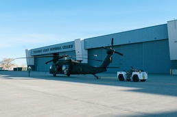 Soldiers Tow an HH-60M Black Hawk