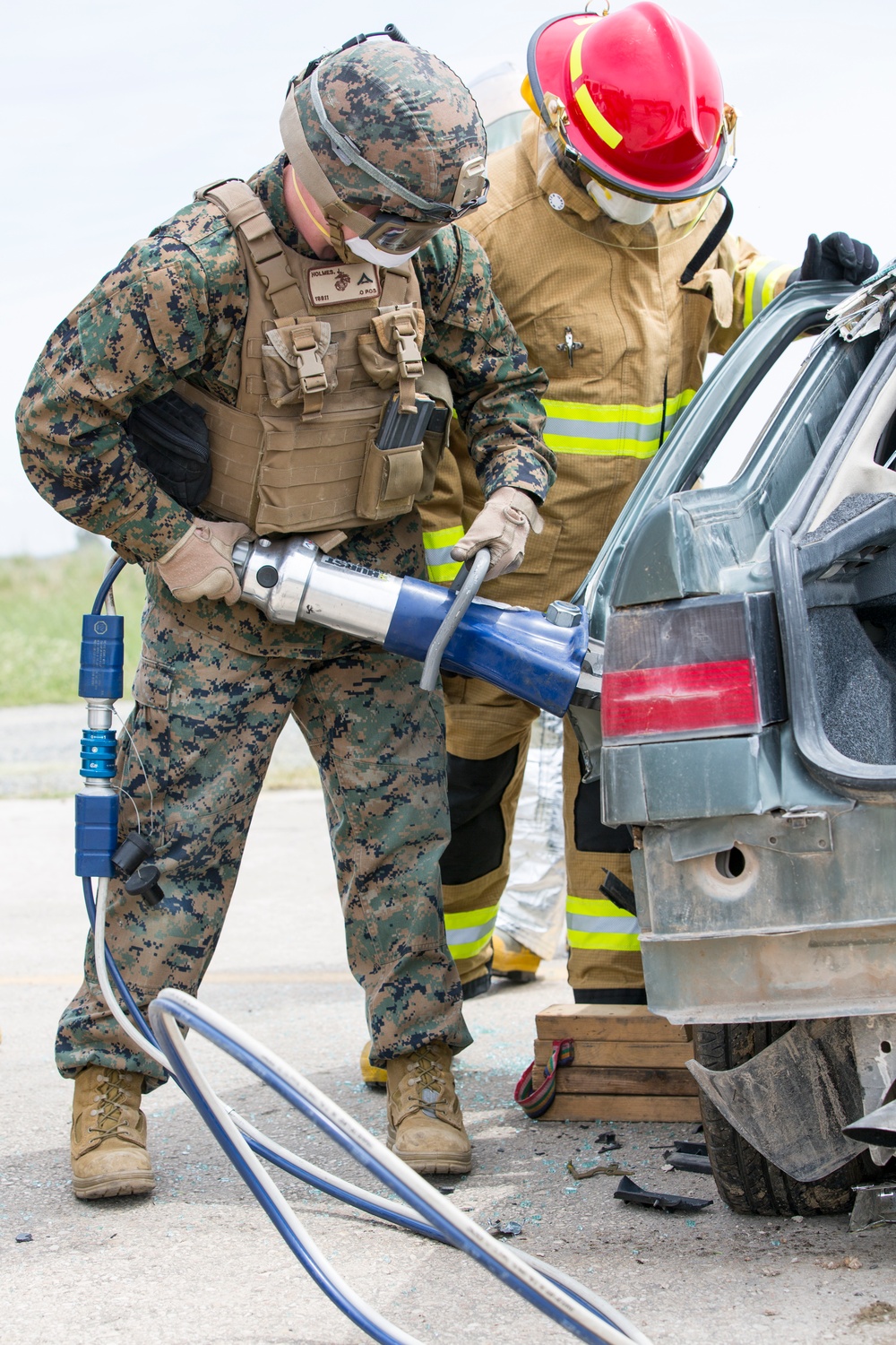 SPMAGTF-CR-AF Marines &amp; Spanish firefighters conduct vehicle extrication training
