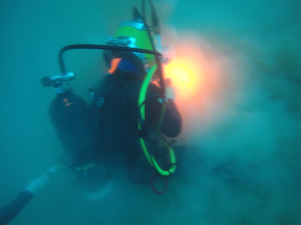Seabee Divers conduct port repairs in Souda Bay, Crete.
