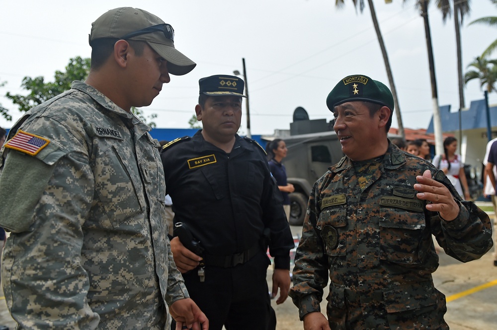 U.S. servicemen celebrate Guatemala labor day with local national army counterparts