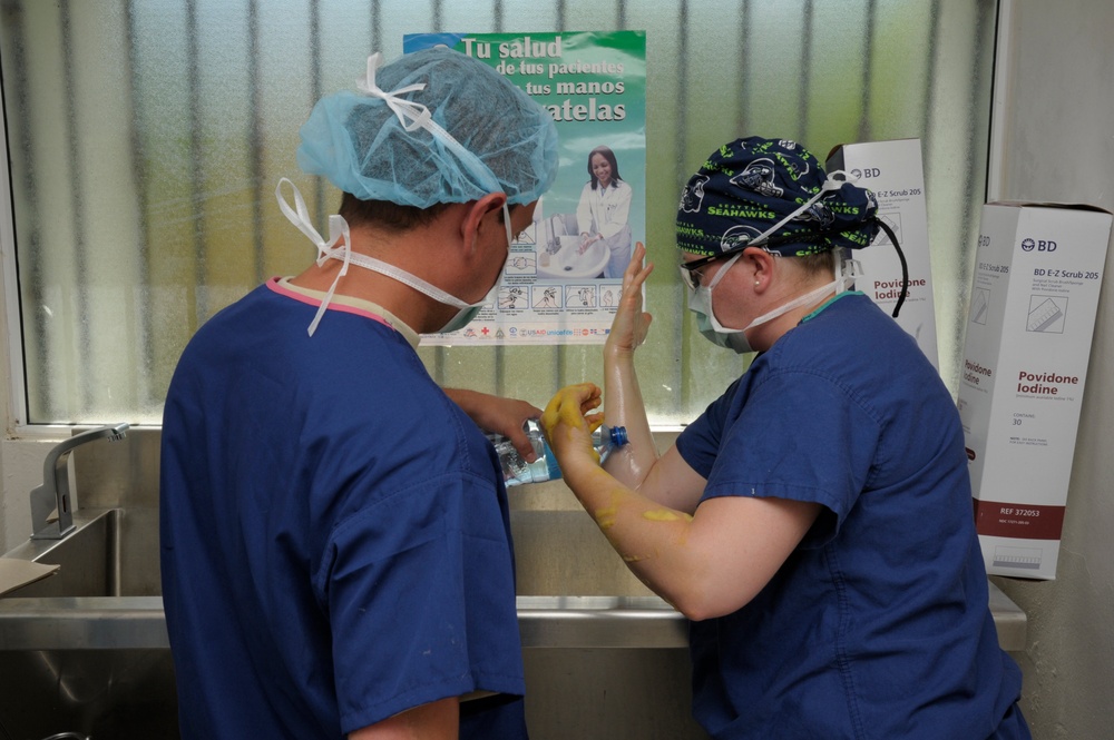 Surgical team practices deploying while providing care