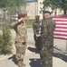 U.S. Army Capt. Briana Bailey salutes Polish Army Col. Artur Bogowicz