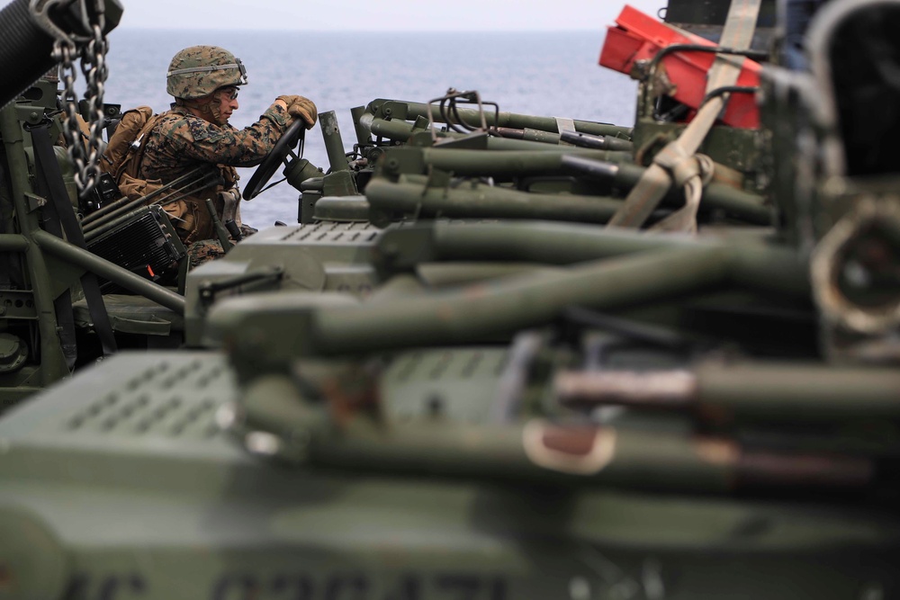 U.S. Marines Prepare to board an MV-22 Osprey