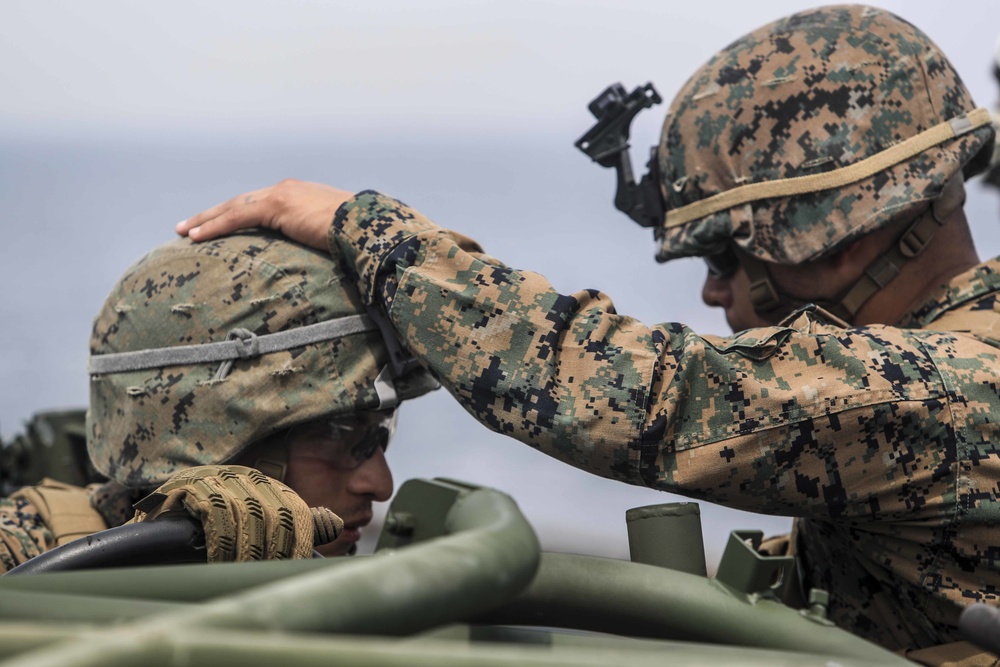 U.S. Marines Prepare to board an MV-22 Osprey