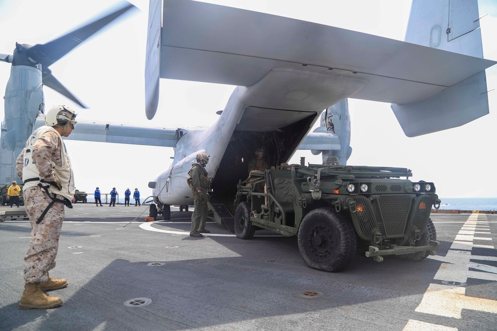 U.S. Marines Prepare to board an MV-22 Osprey